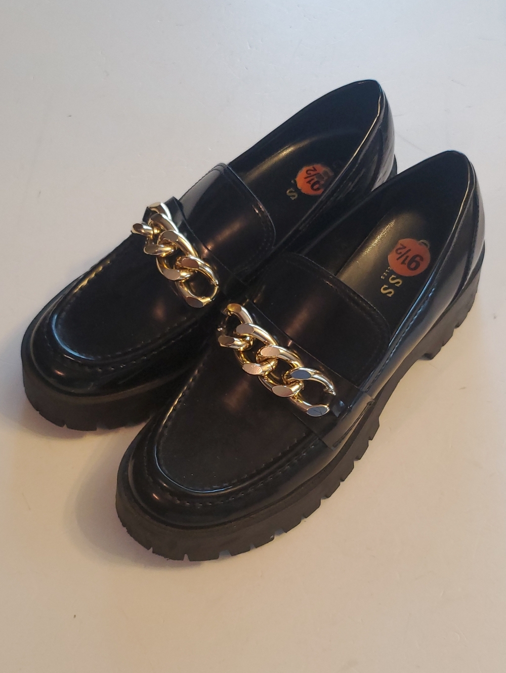 GUESS Black Women's Chunky Loafer with Gold Chain Accent